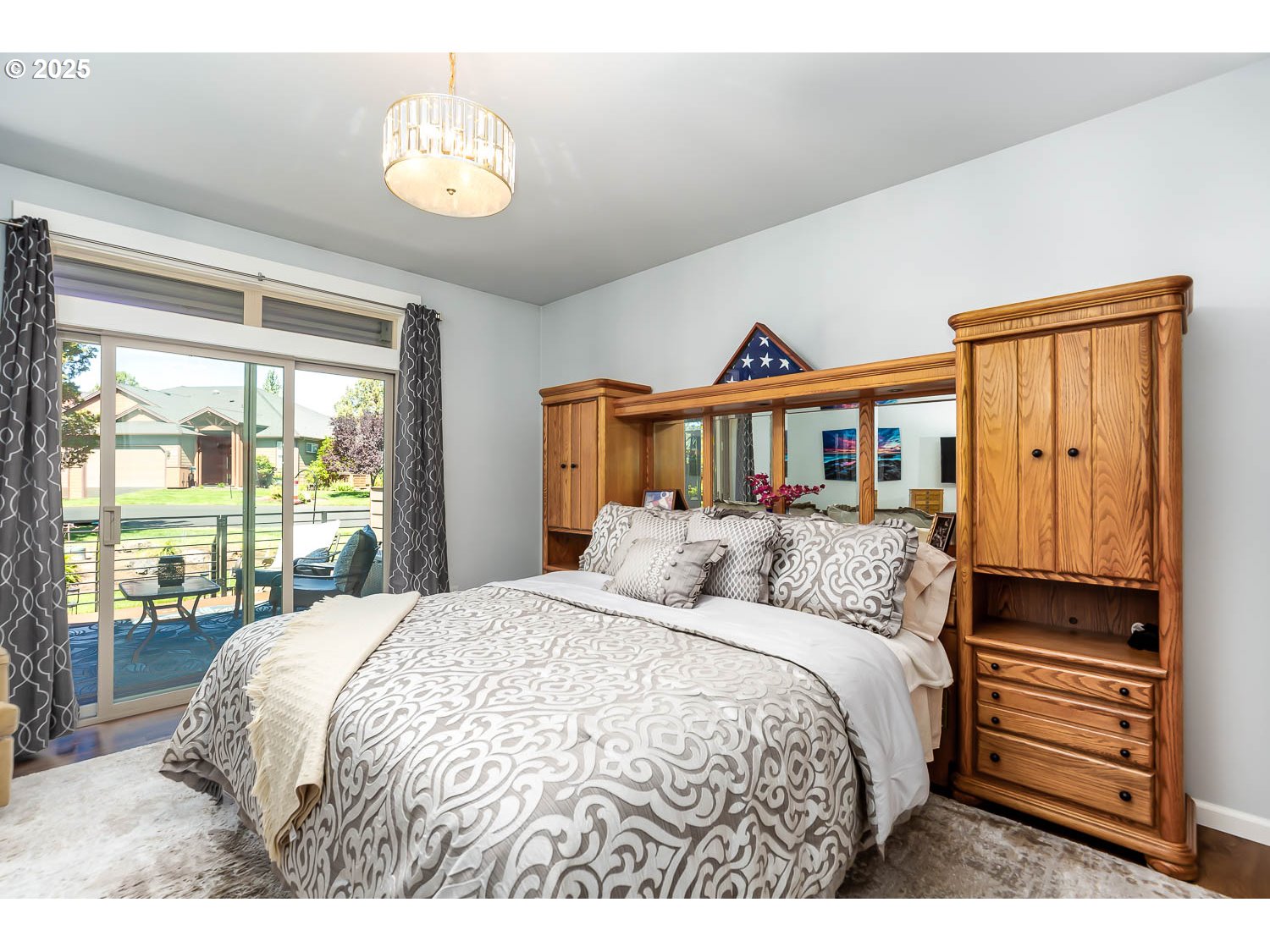 8413 Forest Ridge Loop Redmond, OR 97756 - Photo 15 of 40 a bedroom with a bed and a window