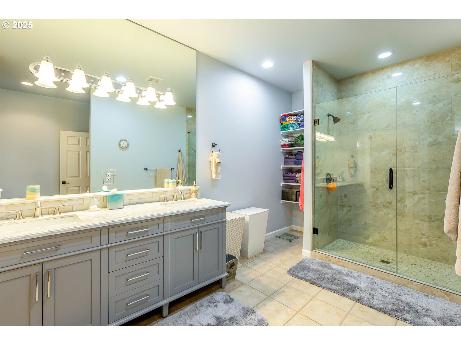 8413 Forest Ridge Loop Redmond, OR 97756 - Photo 20 of 40 a bathroom with a double vanity sink mirror and shower