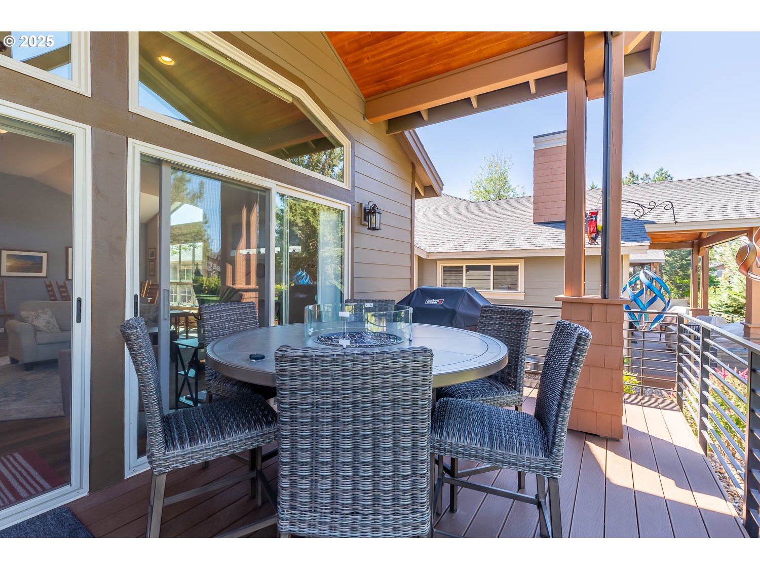 8413 Forest Ridge Loop Redmond, OR 97756 - Photo 28 of 40 a view of a patio with table and chairs