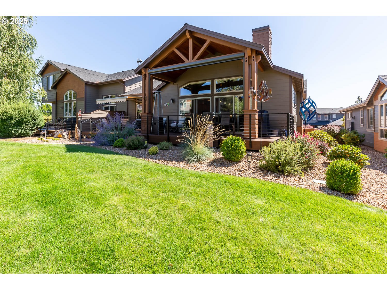8413 Forest Ridge Loop Redmond, OR 97756 - Photo 29 of 40 a front view of a house with garden