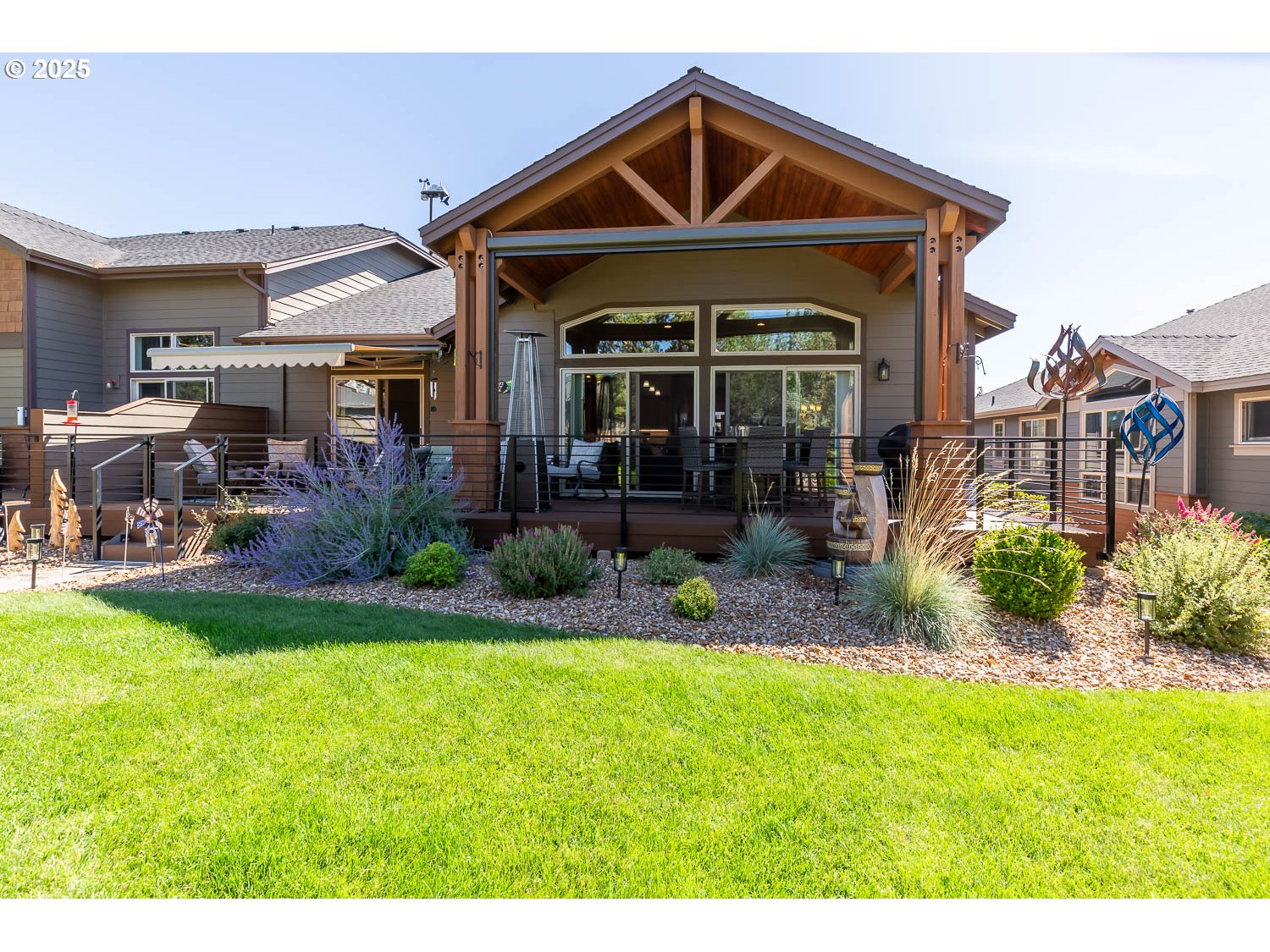 8413 Forest Ridge Loop Redmond, OR 97756 - Photo 30 of 40 a front view of a house with a yard