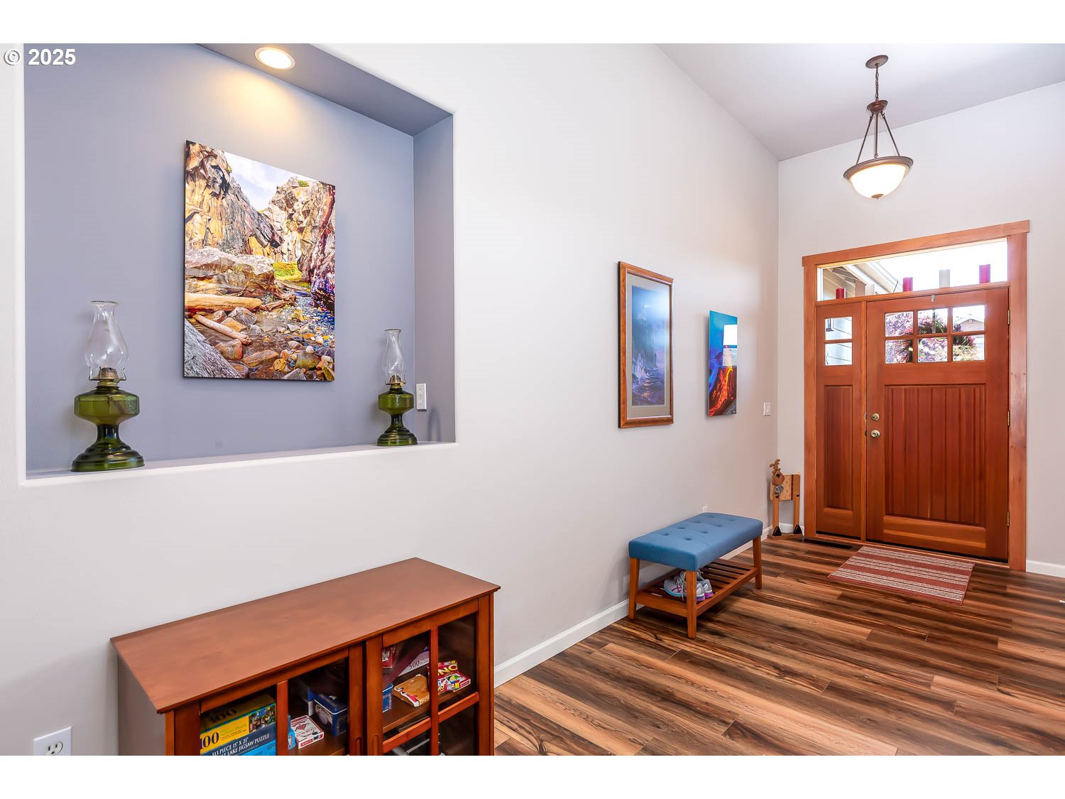 8413 Forest Ridge Loop Redmond, OR 97756 - Photo 3 of 40 a bedroom with a bed and a bookshelf