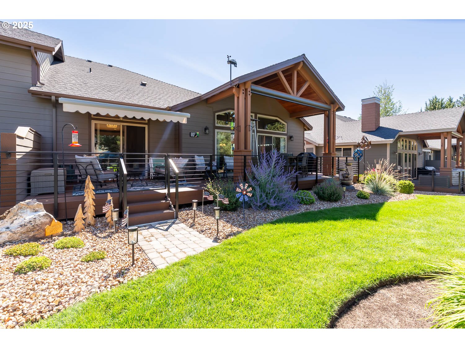 8413 Forest Ridge Loop Redmond, OR 97756 - Photo 31 of 40 a view of a house with swimming pool and sitting area