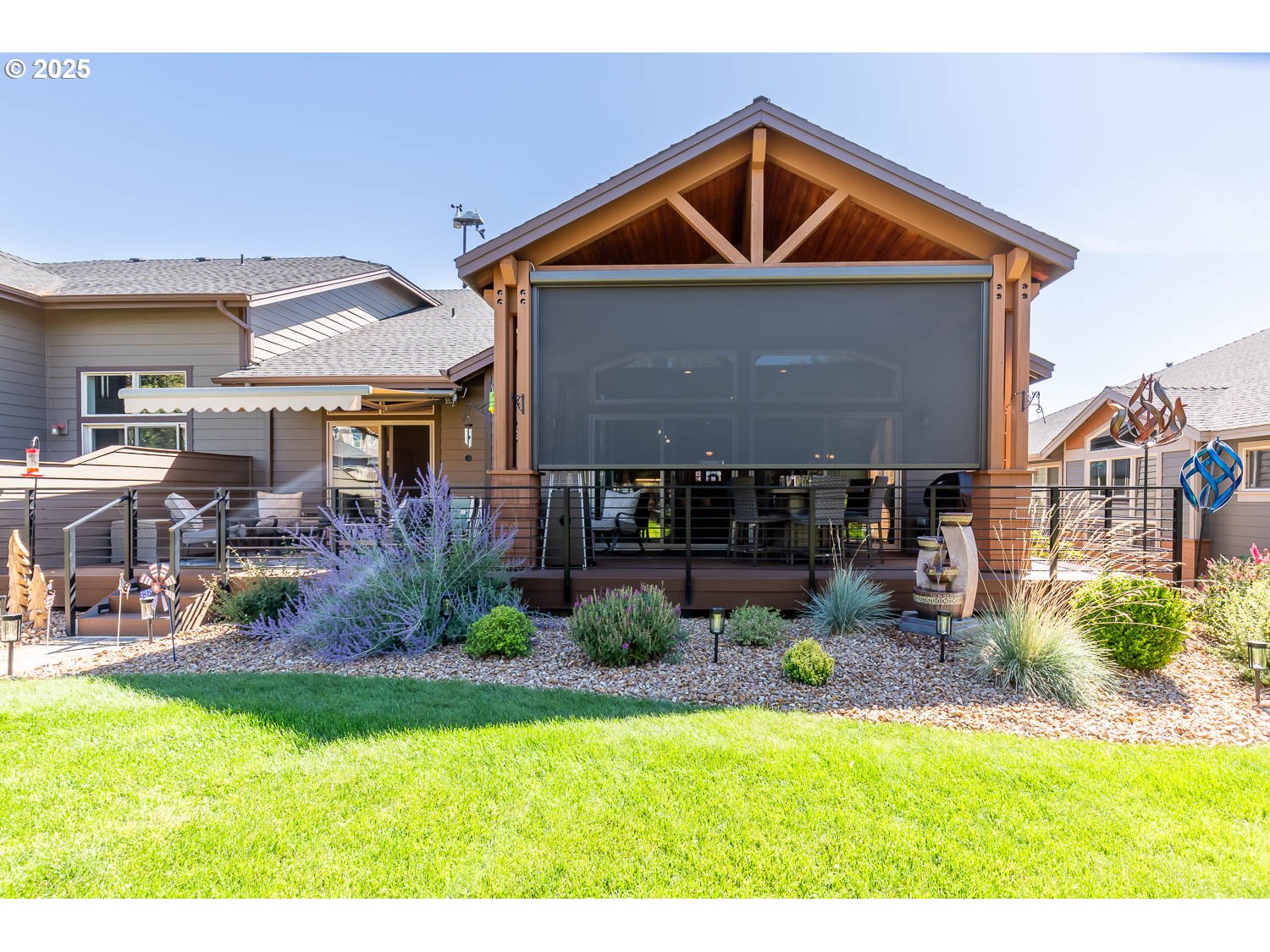 8413 Forest Ridge Loop Redmond, OR 97756 - Photo 32 of 40 a front view of a house with garden