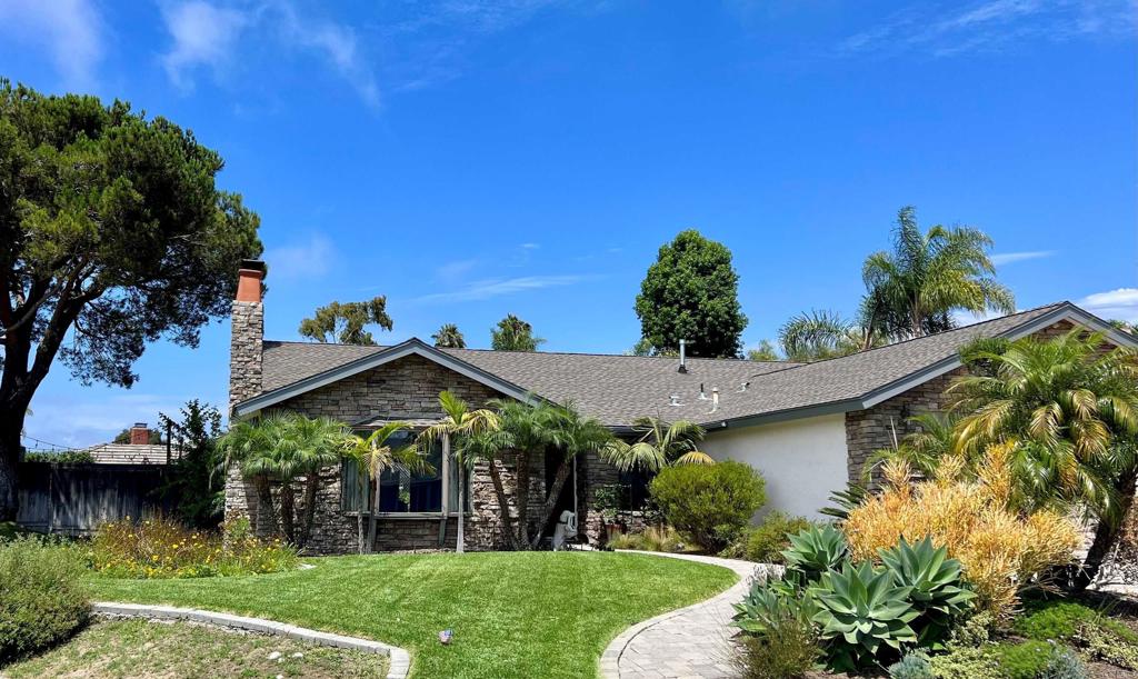 1528 Juniperhill Drive Encinitas, CA 92024 - Photo 1 of 40 a view of a house with a yard and potted plants