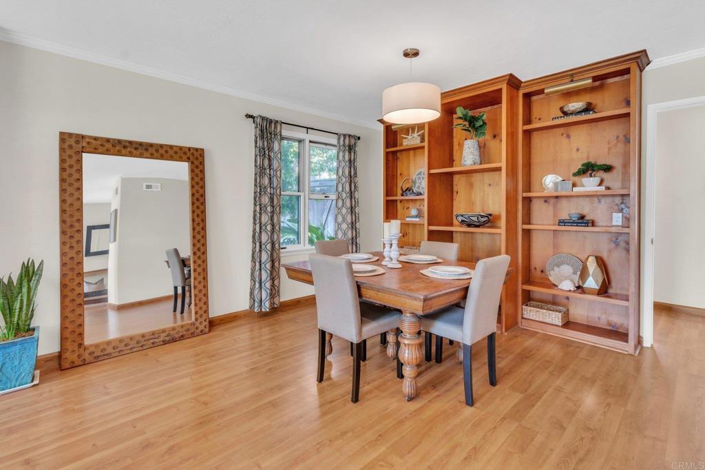1528 Juniperhill Drive Encinitas, CA 92024 - Photo 11 of 40 a dining room with furniture and wooden floor