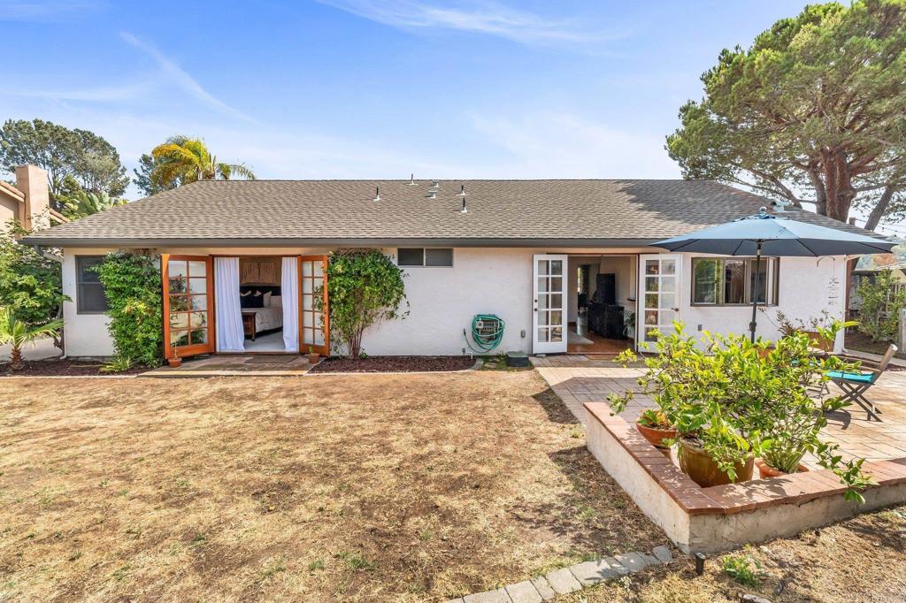 1528 Juniperhill Drive Encinitas, CA 92024 - Photo 30 of 40 front view of a house with a yard