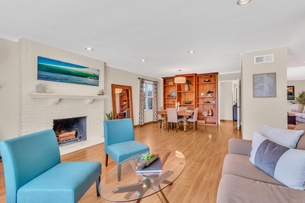 1528 Juniperhill Drive Encinitas, CA 92024 - Photo 8 of 40 a living room with furniture and a fireplace