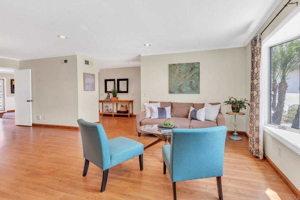 1528 Juniperhill Drive Encinitas, CA 92024 - Photo 9 of 40 a living room with furniture and wooden floor