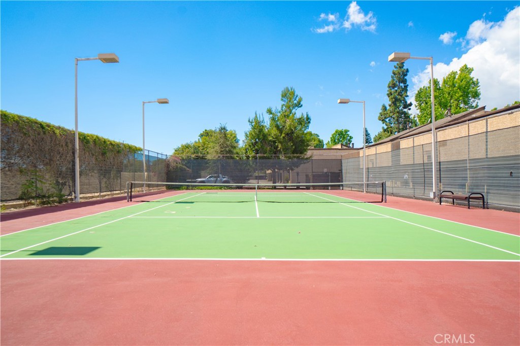 7890 East Spring Street, Unit 14A Long Beach, CA 90815 - Photo 29 of 43 a view of a tennis court