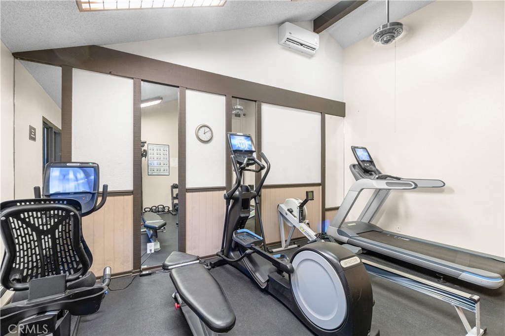 7890 East Spring Street, Unit 14A Long Beach, CA 90815 - Photo 41 of 43 a view of a room with gym equipment