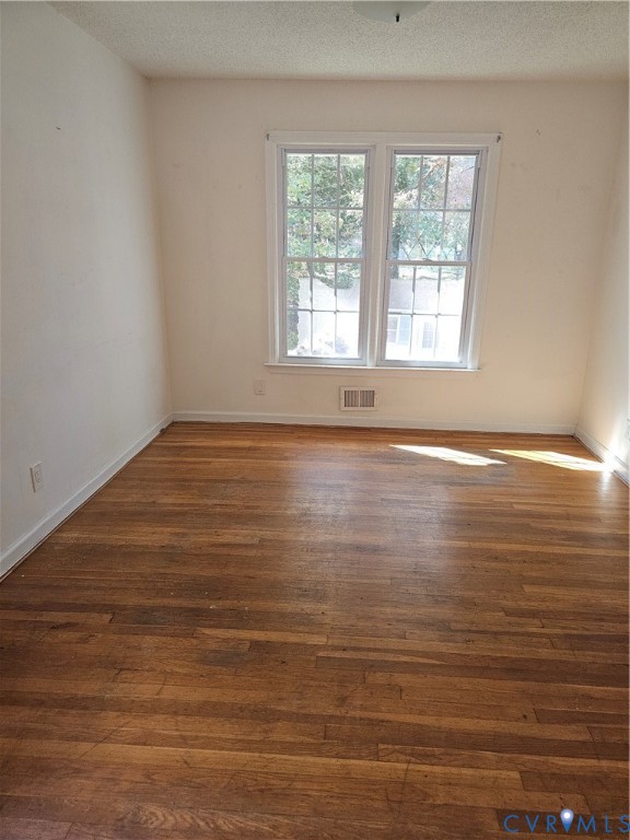 916 Brantley Road Richmond, VA 23235 - Photo 2 of 8 Unfurnished room featuring dark wood-type flooring