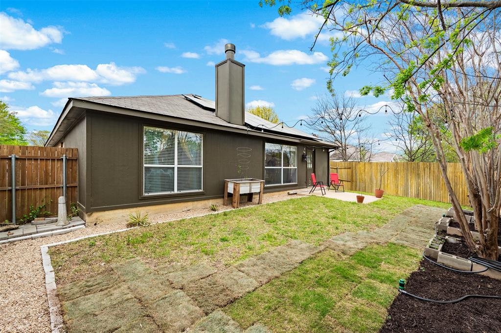 1011 Ridgecrest Drive McKinney, TX 75069 - Photo 29 of 31 Enclosed backyard featuring a privacy fence, a concrete patio, and a gravel path