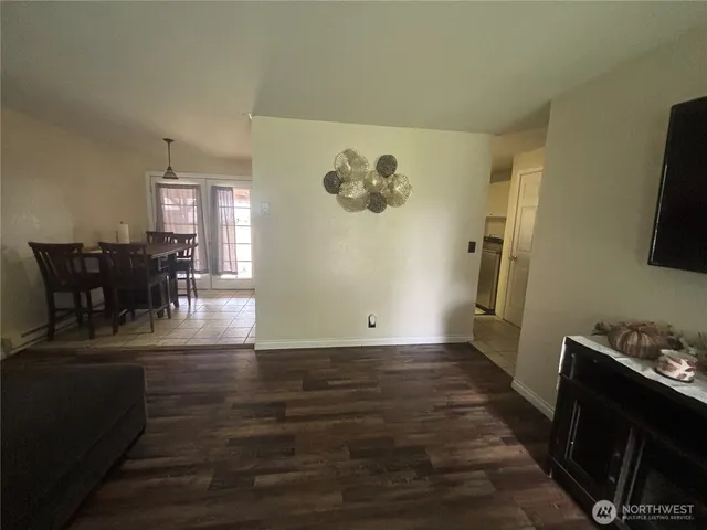 a view of a living room and dining room