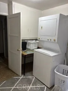 a bathroom with a sink and a washing machine