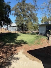 5335 East Avenue I Lancaster, CA 93535 - Photo 5 of 16 a view of a backyard of the house
