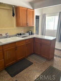 5335 East Avenue I Lancaster, CA 93535 - Photo 7 of 16 a bath room with sink and window