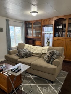 5335 East Avenue I Lancaster, CA 93535 - Photo 9 of 16 a bedroom with furniture and a window