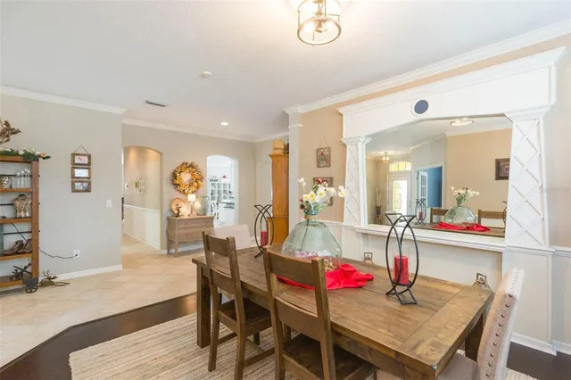 a work room with furniture and wooden floor