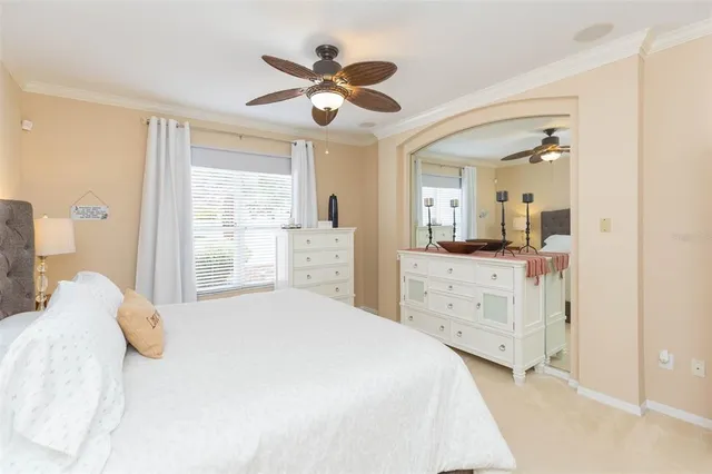 a bathroom with a bathtub a sink a mirror and a shower