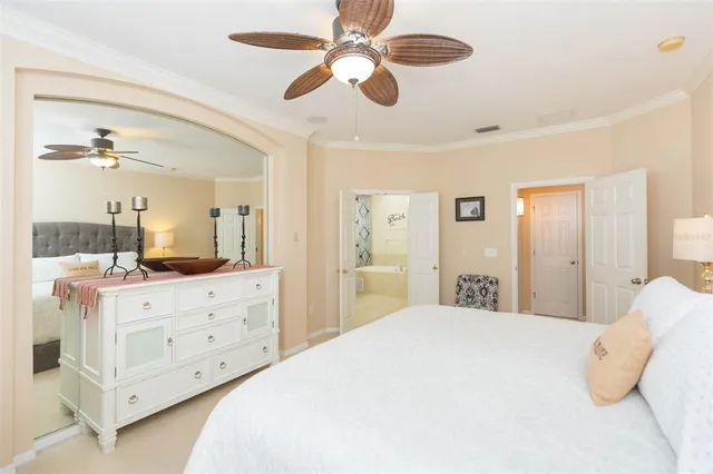 a bedroom with a bed and a cabinets