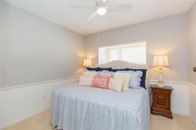 a view of a house with a yard and plants