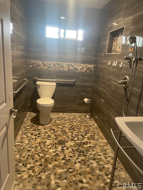 400 North Gibbs Street, Unit 215 WEST SIDE Pomona, CA 91767 - Photo 3 of 10 a bathroom with a toilet