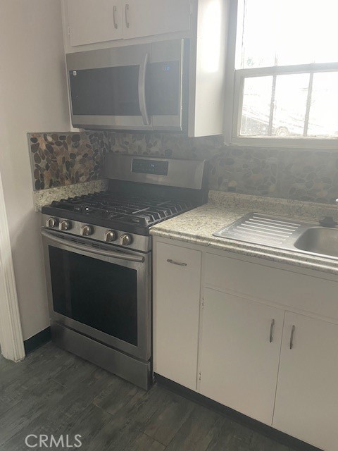 400 North Gibbs Street, Unit 215 WEST SIDE Pomona, CA 91767 - Photo 10 of 10 a utility room with washer and dryer
