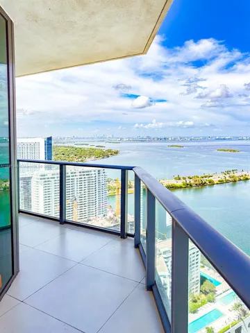a view of a balcony with an ocean view
