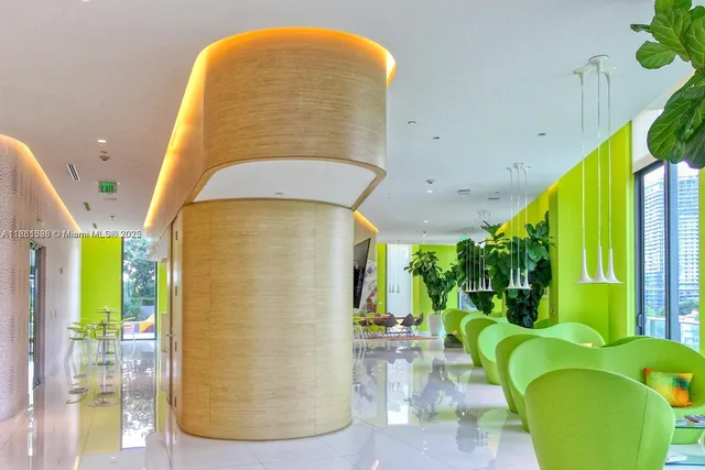 a view of a chairs and table in a patio