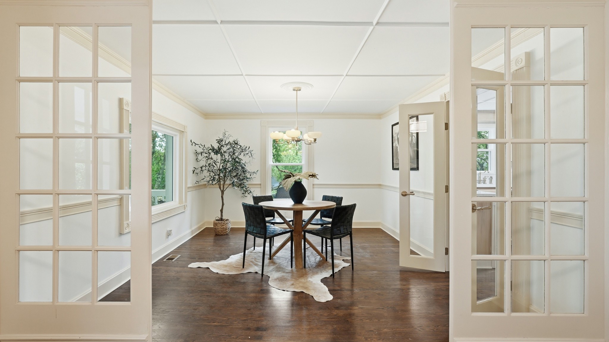 229 Franklin Limestone Road Nashville, TN 37217 - Photo 11 of 41 a dining room with furniture and wooden floor