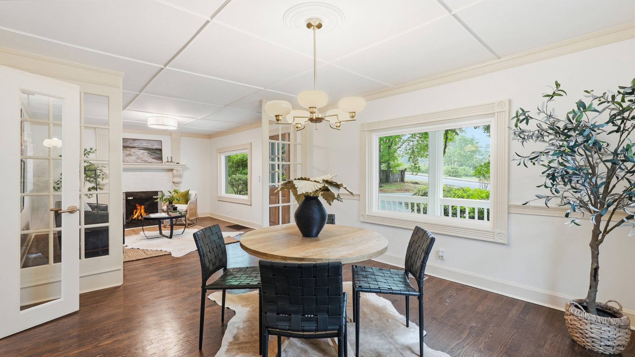 229 Franklin Limestone Road Nashville, TN 37217 - Photo 12 of 41 a view of a dining room with furniture wooden floor and chandelier