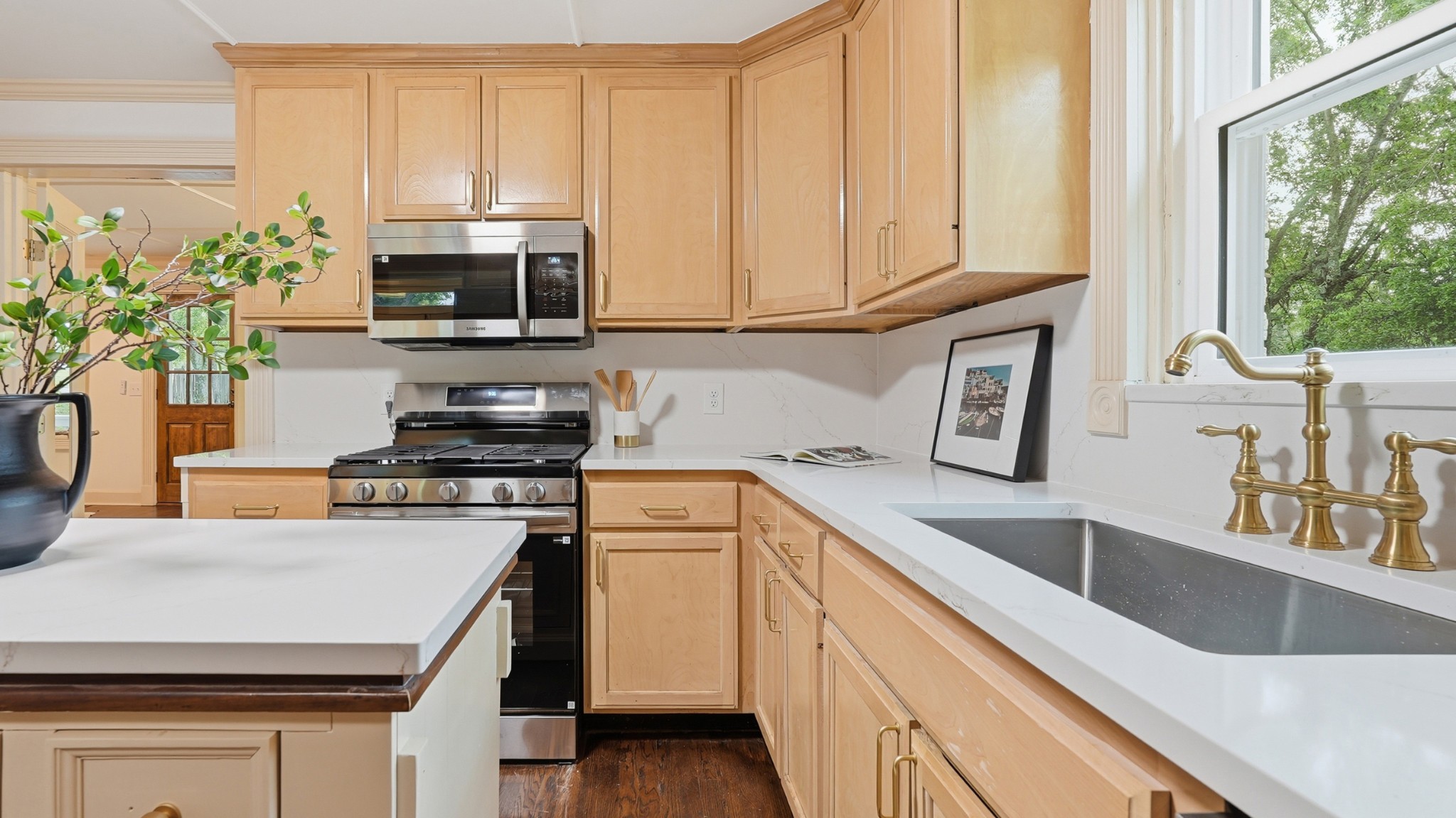 229 Franklin Limestone Road Nashville, TN 37217 - Photo 16 of 41 a kitchen with stainless steel appliances granite countertop a sink a stove and a microwave