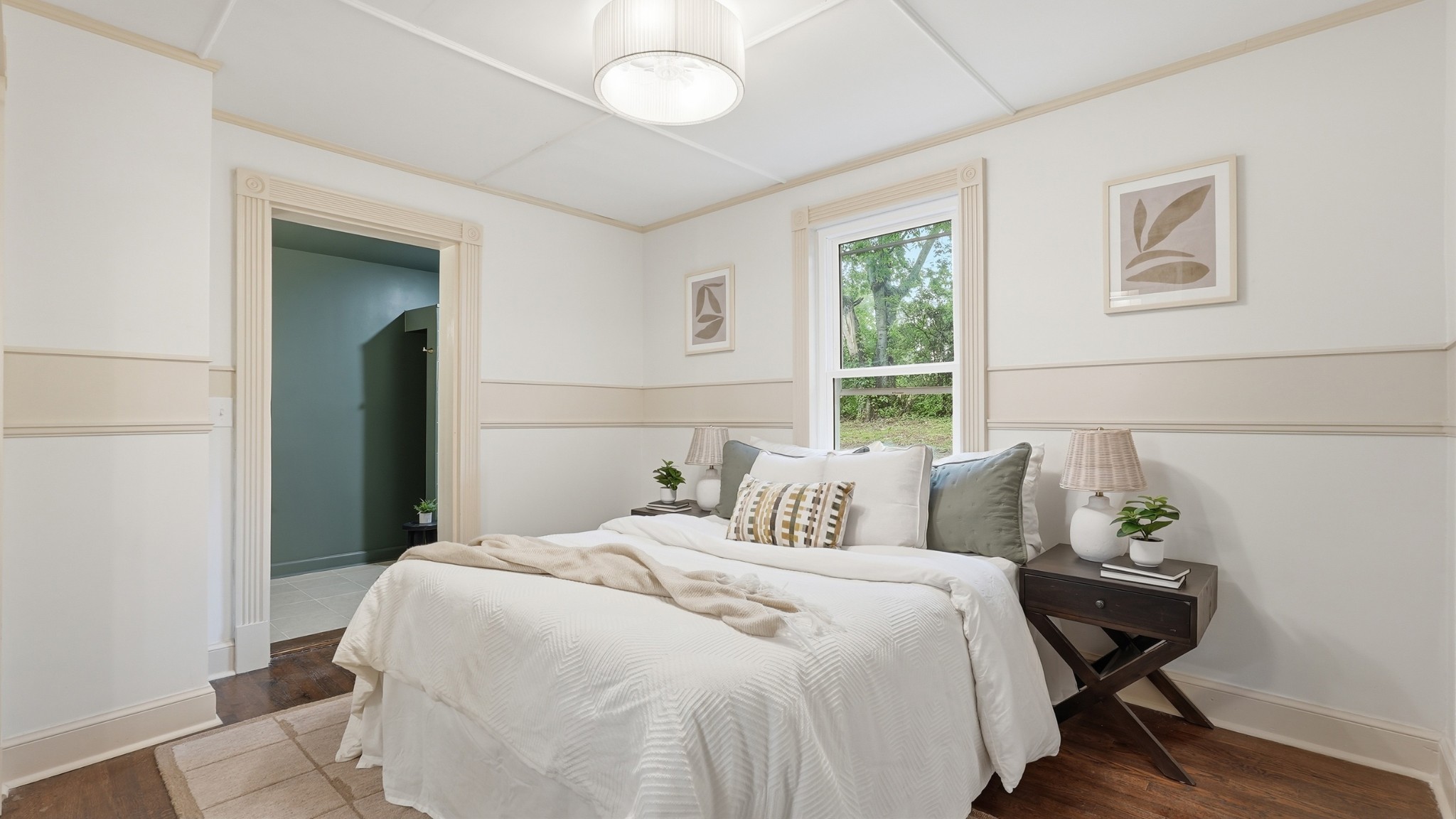 229 Franklin Limestone Road Nashville, TN 37217 - Photo 22 of 41 a bedroom with a bed and wooden floor