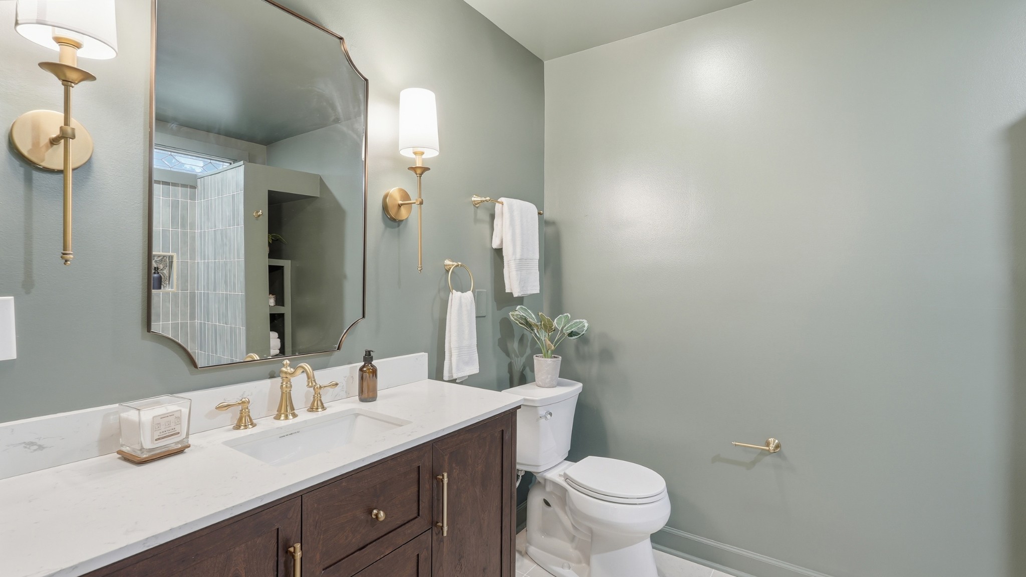 229 Franklin Limestone Road Nashville, TN 37217 - Photo 24 of 41 a bathroom with a granite countertop sink toilet and mirror