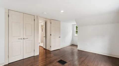 a view of a porch with wooden floor