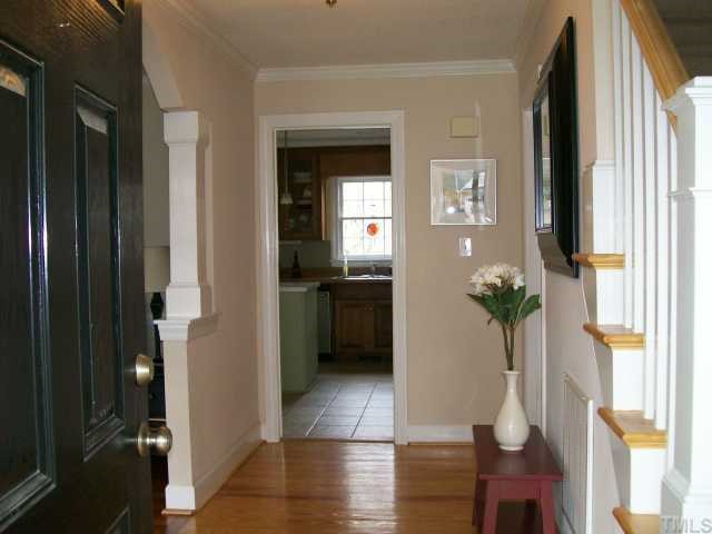 6305 Wynbrook Way Raleigh, NC 27612 - Photo 2 of 12 Greet your family and friends in this nice foyer with hardwood floor.
