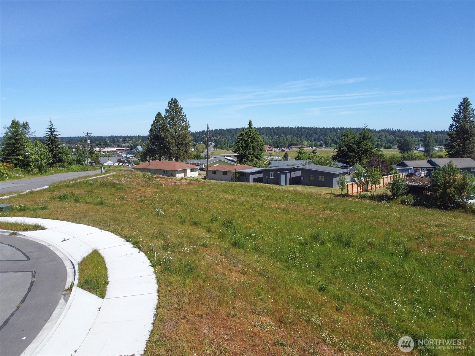 852 South Still Road Sequim, WA 98382 - Photo 1 of 16 a view of a swimming pool with a yard