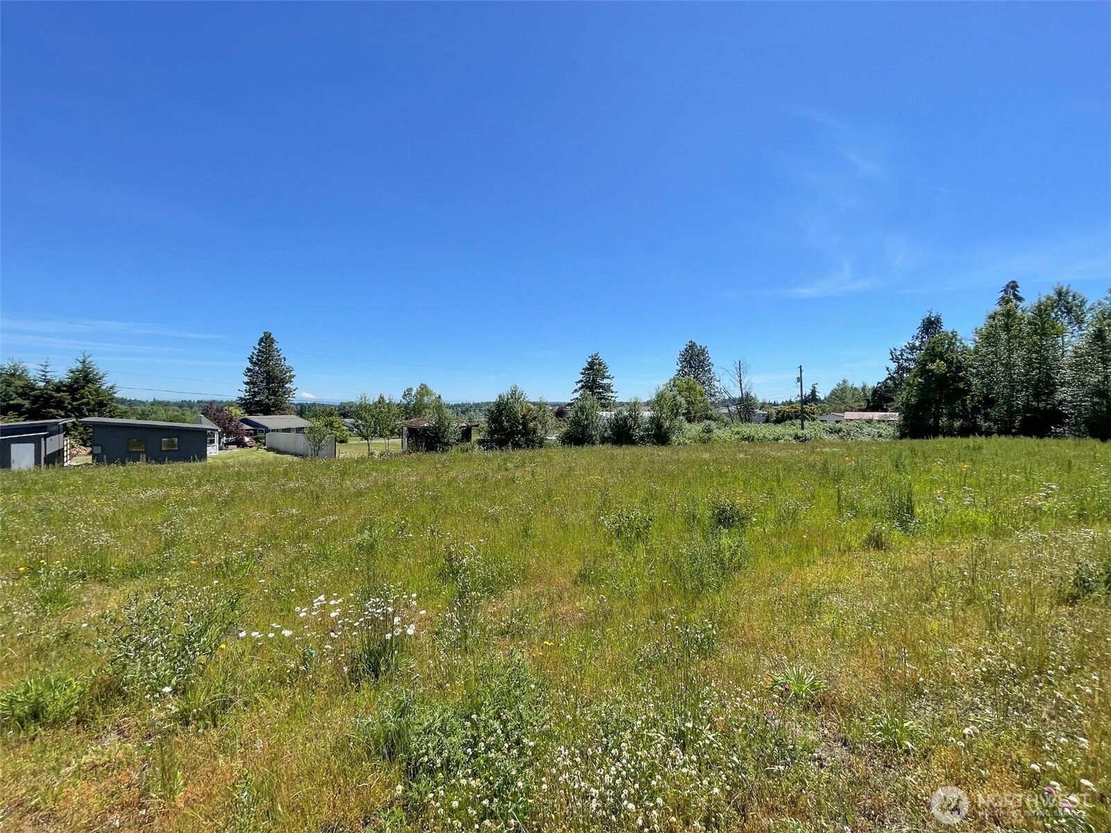 852 South Still Road Sequim, WA 98382 - Photo 13 of 16 a view of a lake with houses