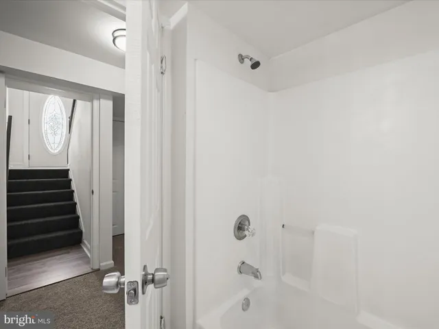 a terrace with trees in the background