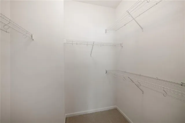 a view of a room with racks on the wall