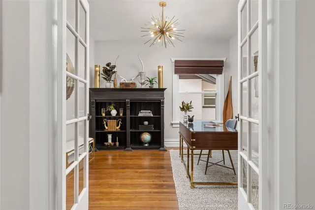 a view of a livingroom with furniture and window