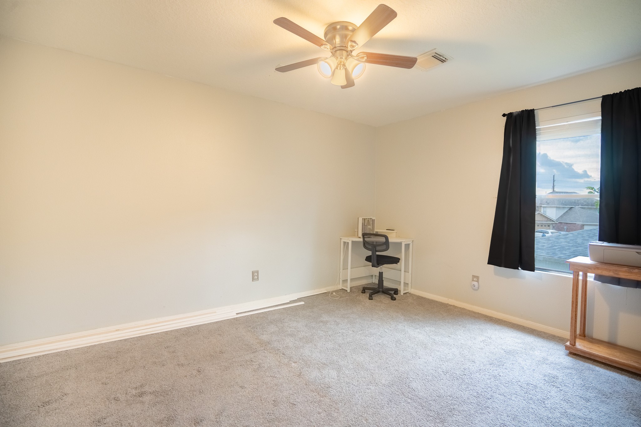 2322 Hadden Hollow Drive Houston, TX 77067 - Photo 21 of 28 wooden floor in an empty room with a window