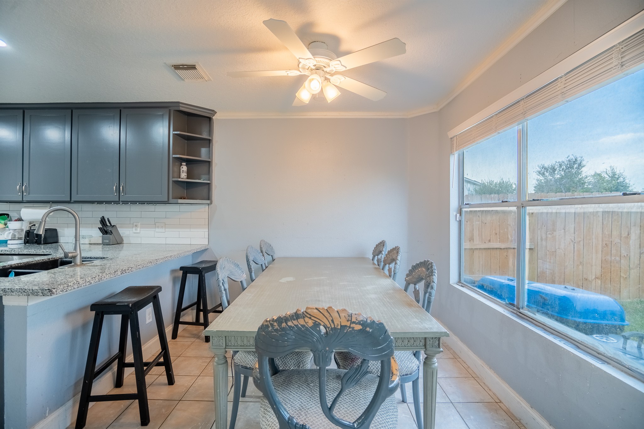 2322 Hadden Hollow Drive Houston, TX 77067 - Photo 9 of 28 a view of a kitchen area with furniture and wooden floor
