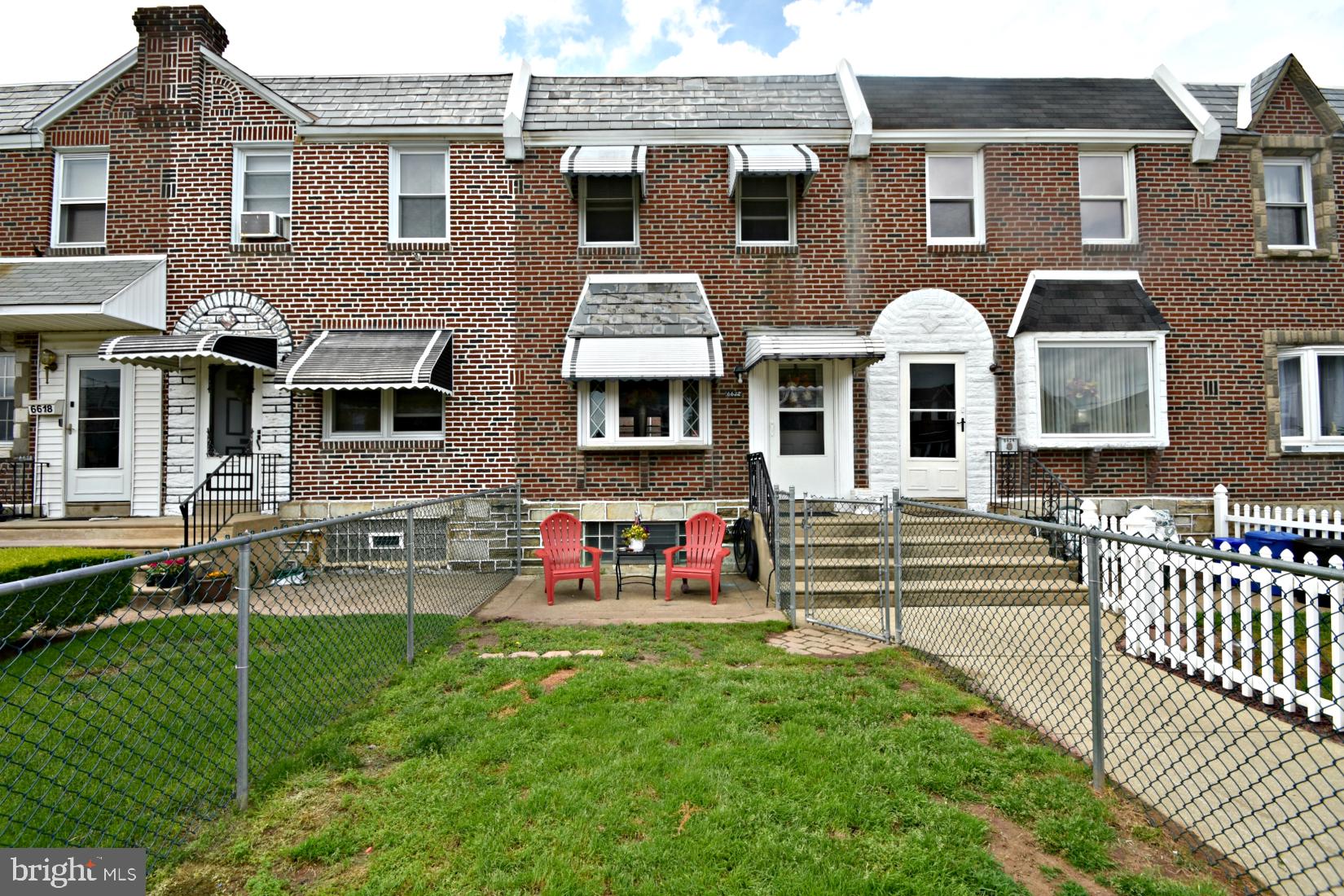 front view of house with a yard