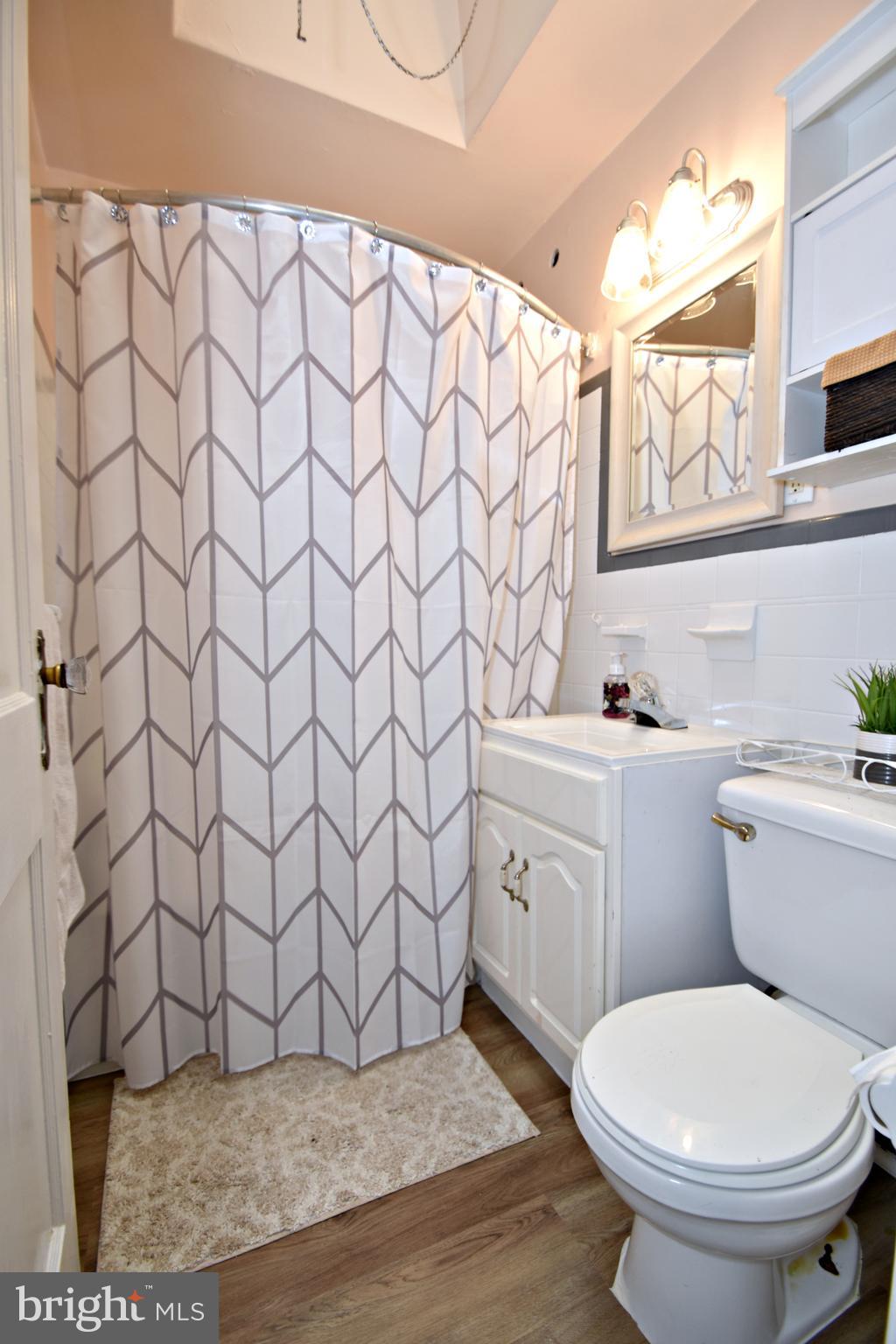 6622 Algard Street Philadelphia, PA 19135 - Photo 18 of 30 a bathroom with a sink and a toilet