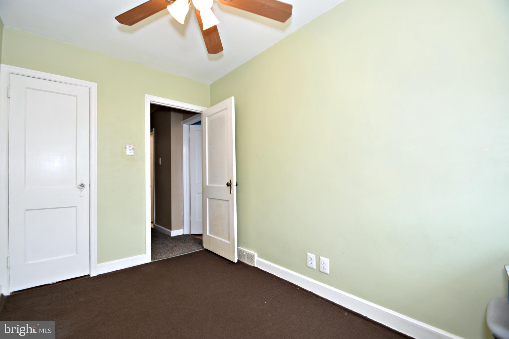 6622 Algard Street Philadelphia, PA 19135 - Photo 19 of 30 an empty room with a ceiling fan