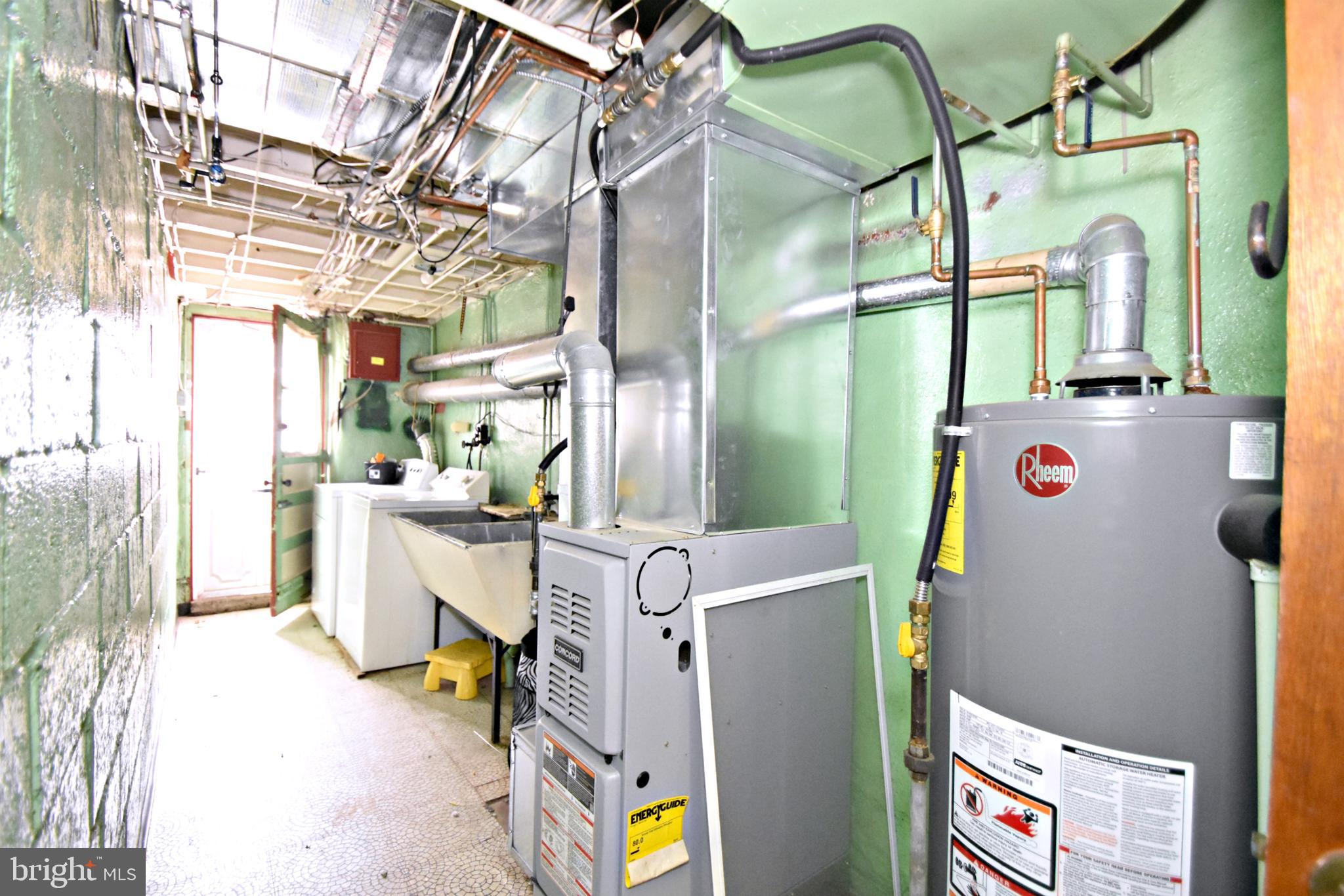 6622 Algard Street Philadelphia, PA 19135 - Photo 26 of 30 a utility room with dryer and washer