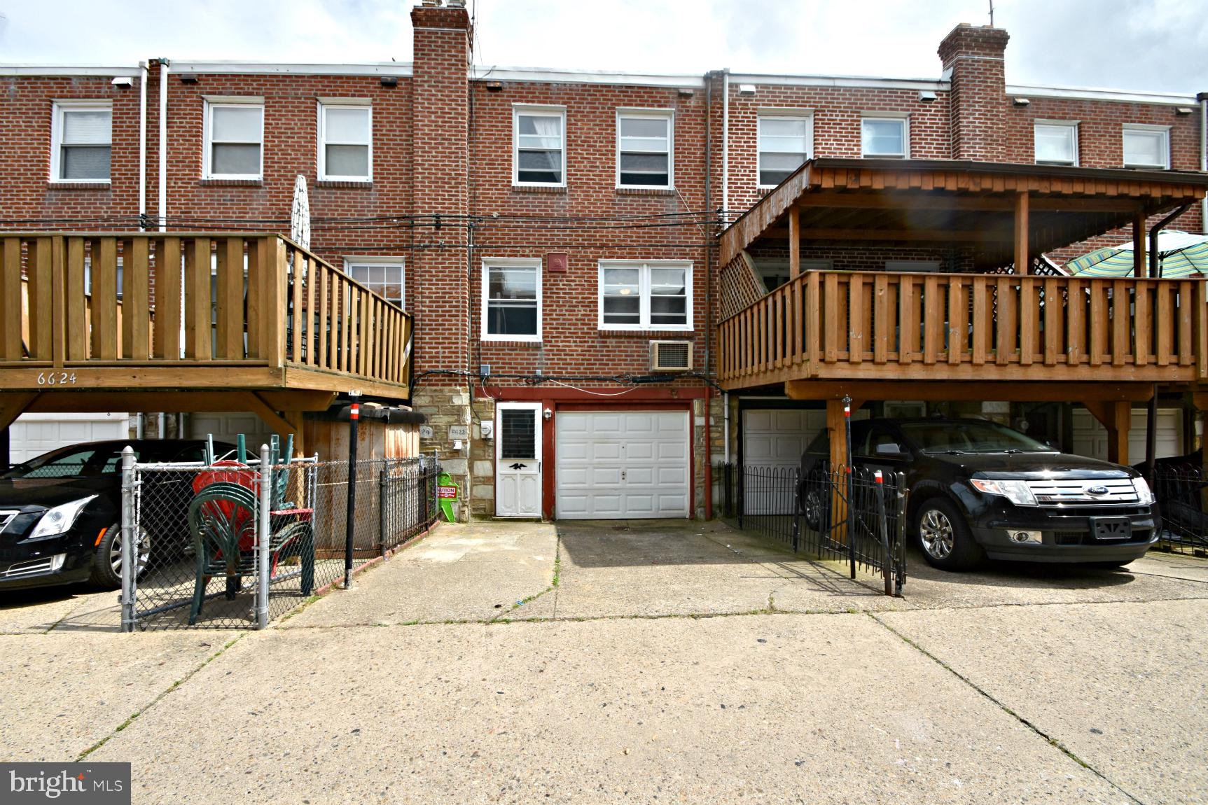 6622 Algard Street Philadelphia, PA 19135 - Photo 28 of 30 a view of a car park in front of a building