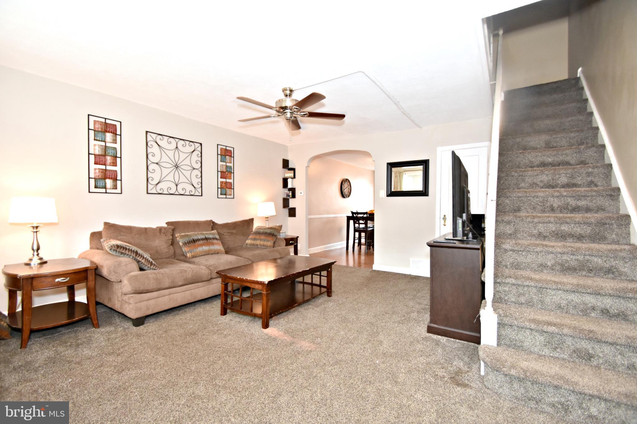 6622 Algard Street Philadelphia, PA 19135 - Photo 4 of 30 a living room with furniture and a rug